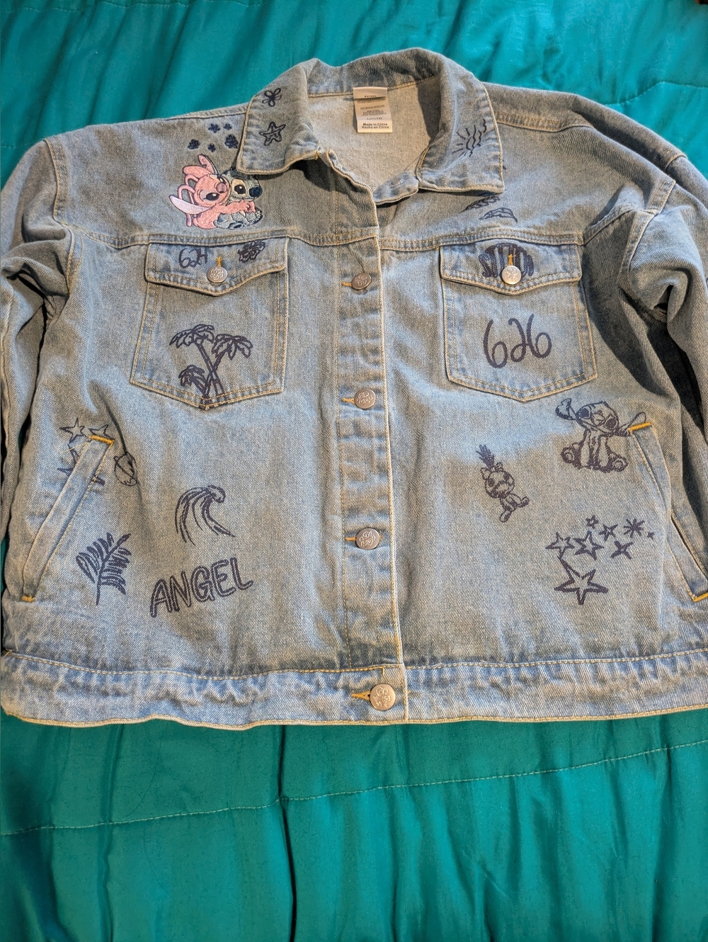 Disney Women's Light Wash Denim Jacket with Embroidered Stitch And Angel